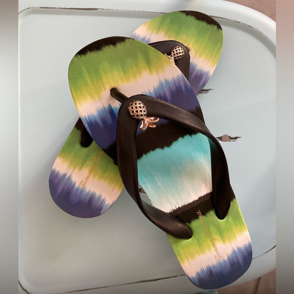 Tommy Bahama healed flip flops.  Size 5 with 1.5 in heels.  Dress up or down!